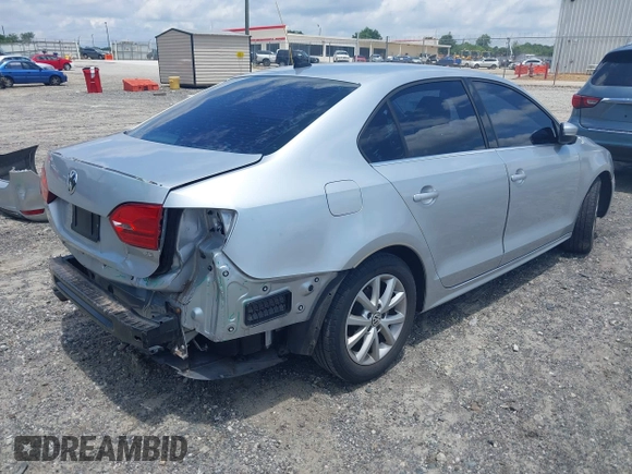 2014 Volkswagen Jetta SE with VIN 3VWD07AJ6EM240396, listed as a IAAI auction lot 42503653 with 146,920 mi miles and . Bid and sale history available at DreamBid. Image 4.