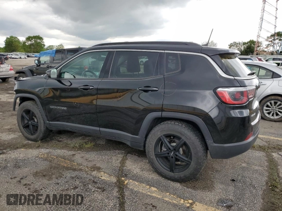 2017 Jeep Compass Latitude z VIN 3C4NJDBB1HT650771, wystawiony jako Copart lot #58190405 z przebiegiem 93 470 mil mil oraz Szkoda całkowita • Salvage title. Historia ofert i sprzedaży dostępna na DreamBid. Obrazek 2.