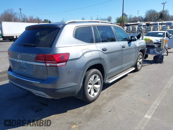 2018 Volkswagen Atlas SE with VIN 1V2CR2CA0JC571988, listed as a IAAI auction lot 41848862 with 96,426 mi miles and . Bid and sale history available at DreamBid. Image 4.