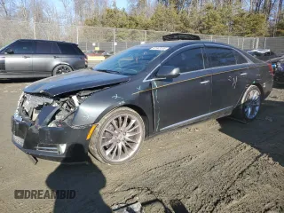 2013 Cadillac XTS Platinum with VIN 2G61V5S3XD9100843, listed as a Copart auction lot 42943555 with 122,153 mi miles and Salvage Title. Bid and sale history available at carsss.com. Image 1.