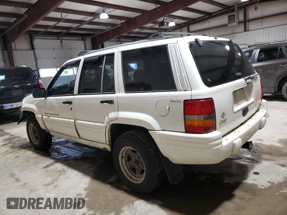 1998 Jeep Grand Cherokee Laredo with VIN 1J4GZ48SXWC183782, listed as a Copart auction lot 41700675 with 226,544 mi miles and Salvage Title. Bid and sale history available at carsss.com. Image 2.