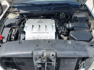 2004 Cadillac DeVille z VIN 1G6KD54Y04U102197, wystawiony jako IAAI lot #41940502 z przebiegiem Nie podano mil oraz . Historia ofert i sprzedaży dostępna na DreamBid. Obrazek 10.