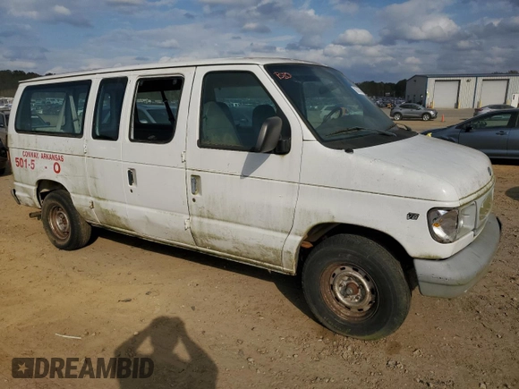 1999 Ford Econoline Passenger XL with VIN 1FMRE11W3XHB81491, listed as a Copart auction lot 78676684 with 142,424 mi miles and Clean Title. Bid and sale history available at DreamBid. Image 4.