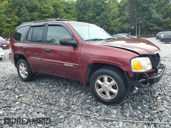 2004 GMC Envoy SLT with VIN 1GKDT13S342336784, listed as a Copart auction lot 66704184 with 169,431 mi miles and Salvage Title. Bid and sale history available at DreamBid. Image 4.