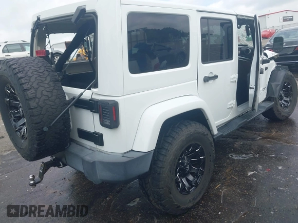 2016 Jeep Wrangler Unlimited Rubicon Hard Rock with VIN 1C4BJWFG3GL228449, listed as a IAAI auction lot 42158318 with Not provided miles and . Bid and sale history available at DreamBid. Image 4.