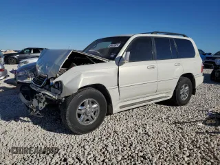 2000 Lexus LX 470 with VIN JT6HT00W7Y0114787, listed as a Copart auction lot 84433924 with Not Provided miles and Salvage Title. Bid and sale history available at carsss.com. Image 1.