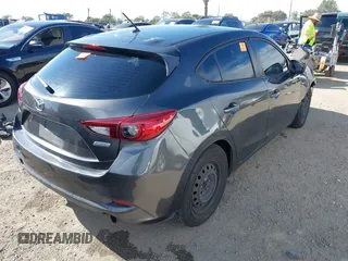 2017 Mazda 3 Sport with VIN 3MZBN1K76HM101415, listed as a IAAI auction lot 42012311 with 222,246 mi miles. Bid and sale history available at carsss.com. Image 4.
