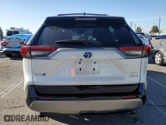 2024 Toyota RAV4 Hybrid XSE with VIN 2T3E6RFV4RW060903, listed as a Copart auction lot 49515785 with 8,637 mi miles and Salvage Title. Bid and sale history available at DreamBid. Image 6.