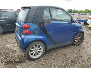 2009 Smart fortwo Pure z VIN WMEEJ31XX9K268413, wystawiony jako Copart lot #55853765 z przebiegiem 58 860 mil mil oraz Szkody całkowita. Historia ofert i sprzedaży dostępna na DreamBid. Obrazek 3.