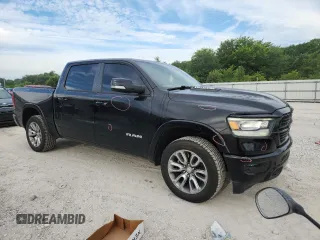 2020 Ram 1500 Laramie with VIN 1C6SRFJT5LN178284, listed as a Copart auction lot 61813575 with 90,699 mi miles and Salvage title. Bid and sale history available at DreamBid. Image 4.
