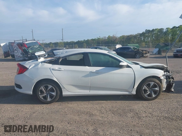 2020 Honda Civic LX with VIN 19XFC2F62LE212421, listed as a IAAI auction lot 41909995 with 46,312 mi miles and . Bid and sale history available at DreamBid. Image 13.