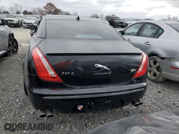 2014 Jaguar XJ with VIN SAJWA2EKXEMV64494, listed as a Copart auction lot 82634004 with 119,811 mi miles and Clean title. Bid and sale history available at DreamBid. Image 6.
