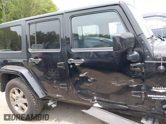 2015 Jeep Wrangler Unlimited Sahara with VIN 1C4HJWEG3FL661568, listed as a IAAI auction lot 42387810 with 140,927 mi miles and . Bid and sale history available at DreamBid. Image 13.
