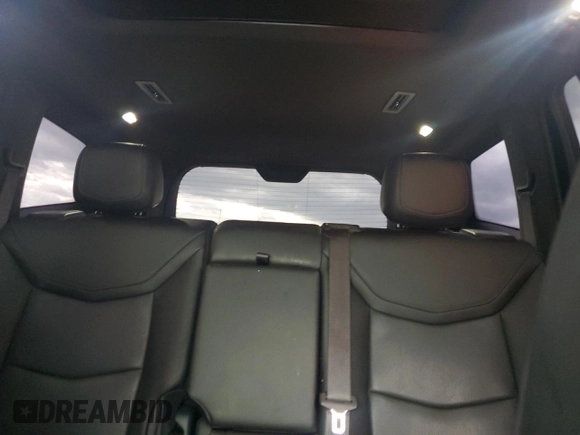 2021 Cadillac XT6 Premium Luxury z VIN 1GYKPCRS1MZ169952, wystawiony jako Copart lot #51908895 z przebiegiem 31 834 mil mil oraz Szkody całkowita. Historia ofert i sprzedaży dostępna na DreamBid. Obrazek 10.