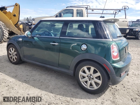 2011 MINI Hardtop S with VIN WMWSV3C55BTY24299, listed as a Copart auction lot 54725755 with 82,489 mi miles and Salvage Title. Bid and sale history available at DreamBid. Image 2.