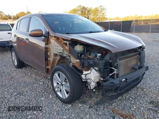 2019 Kia Sportage LX with VIN KNDPM3AC8K7598121, listed as a IAAI auction lot 41805939 with 119,050 mi miles and . Bid and sale history available at carsss.com. Image 1.
