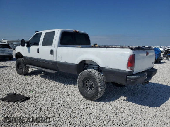 2000 Ford Super Duty F-250 XL with VIN 1FTNW21SXYEA52699, listed as a Copart auction lot 78659054 with 154,056 mi miles and Salvage Title. Bid and sale history available at carsss.com. Image 2.