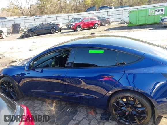 2023 Tesla Model 3 Long Range with VIN 5YJ3E1EB0PF688172, listed as a IAAI auction lot 41411580 with 21,125 mi miles and . Bid and sale history available at DreamBid. Image 14.