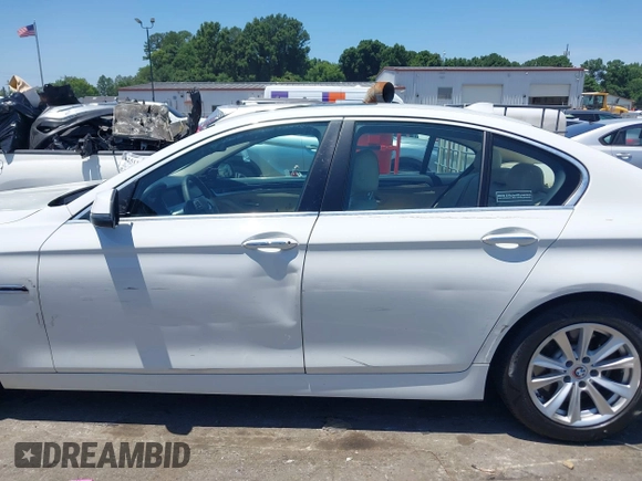 2014 BMW 5 Series 528i with VIN WBA5A5C57ED501861, listed as a IAAI auction lot 42524914 with Not provided miles and . Bid and sale history available at DreamBid. Image 13.
