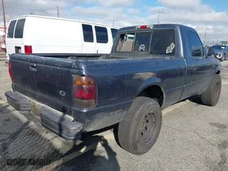 1998 Ford Ranger XL with VIN 1FTYR10C1WUB61936, listed as a IAAI auction lot 41514003 with 327,602 mi miles. Bid and sale history available at carsss.com. Image 4.
