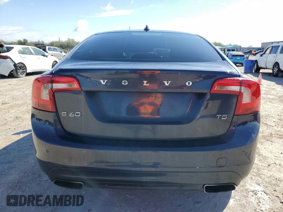2014 Volvo S60 T5 z VIN YV1612FSXE1297575, wystawiony jako Copart lot #46664245 z przebiegiem 128 429 mil mil oraz Szkoda całkowita • Salvage title. Historia ofert i sprzedaży dostępna na DreamBid. Obrazek 6.