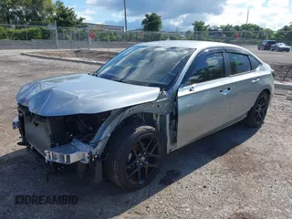 2025 Honda Civic Sport z VIN 2HGFE2F59SH549528, wystawiony jako IAAI lot #42232674 z przebiegiem 8 889 mil mil oraz . Historia ofert i sprzedaży dostępna na DreamBid. Obrazek 17.