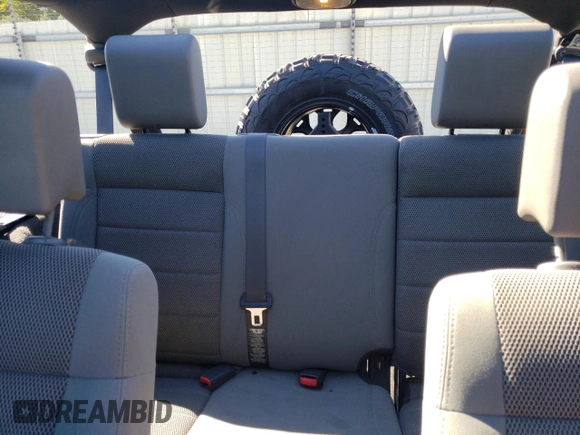 2007 Jeep Wrangler Unlimited Sahara with VIN 1J4GA59197L141821, listed as a Copart auction lot 76897044 with 124,070 mi miles and Salvage title. Bid and sale history available at DreamBid. Image 10.