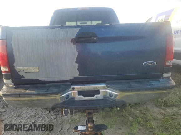 2003 Ford F-350 with VIN 1FTSW30PX3EC59706, listed as a Copart auction lot 74680424 with 155,093 mi miles and Salvage title. Bid and sale history available at DreamBid. Image 6.