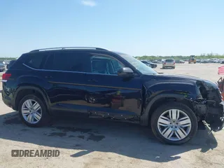 2019 Volkswagen Atlas SE z VIN 1V2WR2CA4KC595211, wystawiony jako IAAI lot #41986643 z przebiegiem 96 299 mil mil oraz . Historia ofert i sprzedaży dostępna na DreamBid. Obrazek 13.