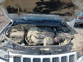 2015 Jeep Grand Cherokee Overland with VIN 1C4RJFCGXFC880096, listed as a IAAI auction lot 42706085 with 74,044 mi miles and . Bid and sale history available at DreamBid. Image 10.