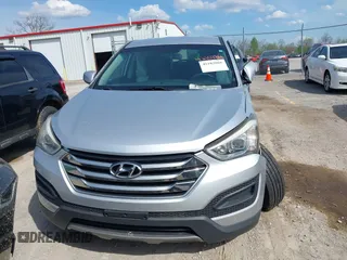 2016 Hyundai Santa Fe z VIN 5XYZTDLB0GG338313, wystawiony jako IAAI lot #42103866 z przebiegiem 111 555 mil mil oraz . Historia ofert i sprzedaży dostępna na DreamBid. Obrazek 12.