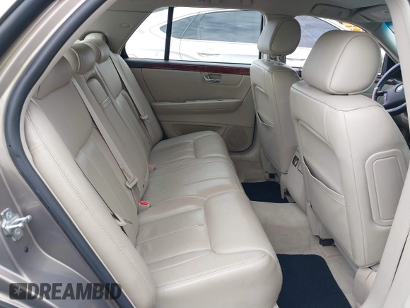 2007 Cadillac DTS Luxury I z VIN 1G6KD57Y97U168196, wystawiony jako IAAI lot #41463856 z przebiegiem 167 875 mil mil oraz . Historia ofert i sprzedaży dostępna na DreamBid. Obrazek 8.