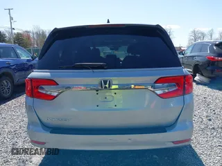 2018 Honda Odyssey EX-L with VIN 5FNRL6H75JB092633, listed as a IAAI auction lot 41971589 with 103,099 mi miles and . Bid and sale history available at DreamBid. Image 17.