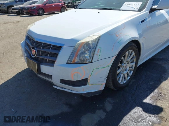 2011 Cadillac CTS Luxury with VIN 1G6DE5EY5B0119957, listed as a IAAI auction lot 41642172 with 228,401 mi miles and . Bid and sale history available at DreamBid. Image 6.