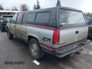 1994 GMC Sierra 1500 z VIN 2GTEK19K0R1559706, wystawiony jako IAAI lot #41906905 z przebiegiem 236 787 mil mil oraz . Historia ofert i sprzedaży dostępna na DreamBid. Obrazek 3.