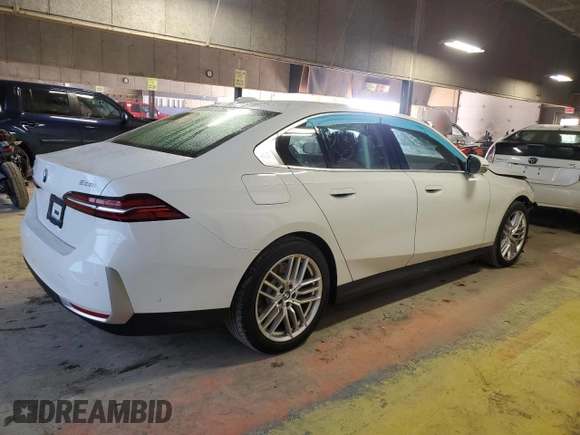 2024 BMW 5 Series 530i xDrive with VIN WBA53FJ02RCR63733, listed as a Copart auction lot 41767235 with Not provided miles and Clean title. Bid and sale history available at DreamBid. Image 3.