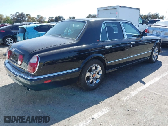 2001 Bentley Arnage with VIN SCBLC31E11CX06297, listed as a IAAI auction lot 41980275 with 63,510 mi miles and . Bid and sale history available at DreamBid. Image 4.