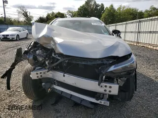 2022 Lexus NX with VIN JTJAGCEZ8N2003942, listed as a Copart auction lot 71154054 with 28,026 mi miles and Salvage Title. Bid and sale history available at carsss.com. Image 5.