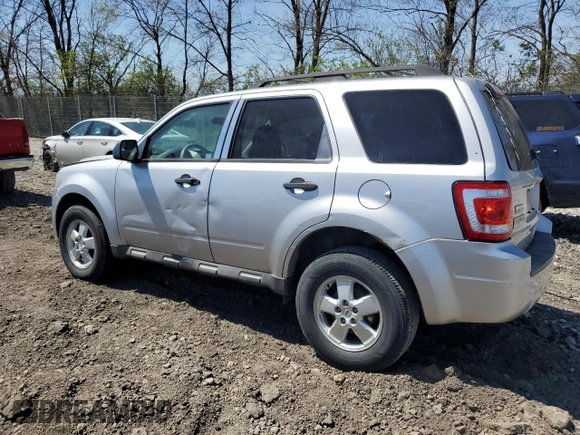 2010 Ford Escape XLS with VIN 1FMCU9C70AKC85380, listed as a Copart auction lot 52868005 with 302,211 mi miles and Clean title. Bid and sale history available at DreamBid. Image 2.