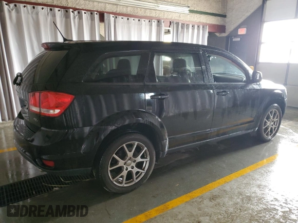 2015 Dodge Journey R/T with VIN 3C4PDDEG7FT749387, listed as a Copart auction lot 52973235 with 127,753 mi miles and Clean Title. Bid and sale history available at DreamBid. Image 3.