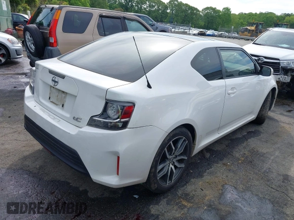 2014 Scion tC z VIN JTKJF5C77E3082073, wystawiony jako IAAI lot #42107615 z przebiegiem 223 895 mil mil oraz . Historia ofert i sprzedaży dostępna na DreamBid. Obrazek 4.