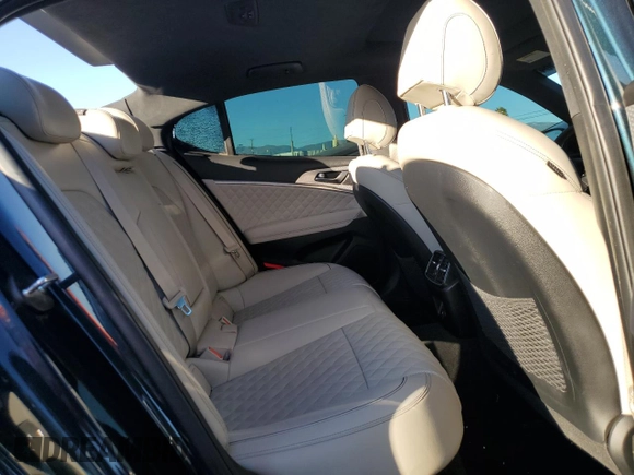 2023 Genesis G70 3.3T with VIN KMTG54TE1PU106881, listed as a Copart auction lot 83988384 with 70,698 mi miles and Salvage Title. Bid and sale history available at DreamBid. Image 10.