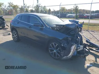 2018 BMW X2 xDrive28i with VIN WBXYJ5C33JEF69549, listed as a IAAI auction lot 40695422 with 95,000 mi miles. Bid and sale history available at carsss.com. Image 1.