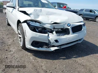 2018 BMW 3 Series 320i xDrive with VIN WBA8A3C5XJA505321, listed as a IAAI auction lot 42146927 with 47,547 mi miles and . Bid and sale history available at DreamBid. Image 6.