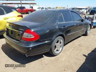 2007 Mercedes-Benz E-Class Sport 5.5L with VIN WDBUF72XX7A988796, listed as a IAAI auction lot 42052924 with 180,169 mi miles. Bid and sale history available at carsss.com. Image 4.