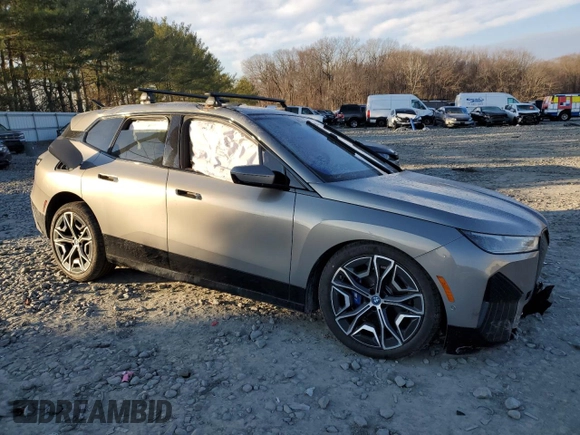 2023 BMW iX M60 with VIN WB533CF08PCK44321, listed as a Copart auction lot 88594075 with 13,829 mi miles and Salvage Title. Bid and sale history available at carsss.com. Image 4.