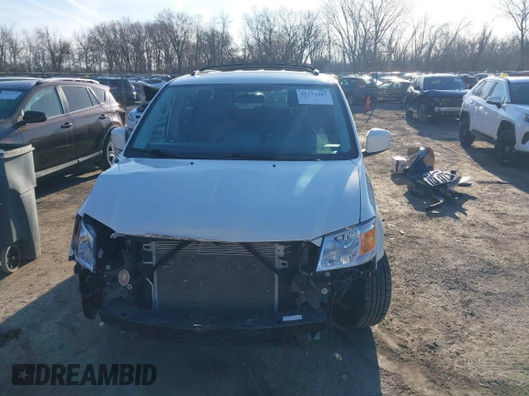 2010 Dodge Grand Caravan SXT with VIN 2D4RN5DX8AR239352, listed as a IAAI auction lot 41773487 with 86,084 mi miles and . Bid and sale history available at DreamBid. Image 12.