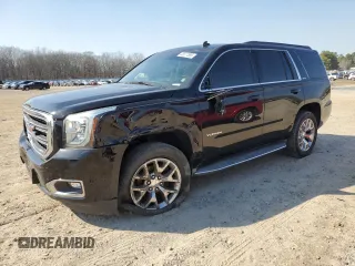 2015 GMC Yukon SLE with VIN 1GKS1AKC0FR228818, listed as a Copart auction lot 48677585 with 175,950 mi miles and Clean Title. Bid and sale history available at carsss.com. Image 1.