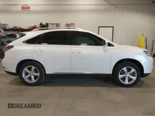 2015 Lexus RX 350 with VIN 2T2BK1BA3FC280960, listed as a IAAI auction lot 41179709 with 129,373 mi miles and . Bid and sale history available at DreamBid. Image 14.
