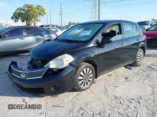 2009 Nissan Versa 1.8 SL with VIN 3N1BC13E79L476570, listed as a IAAI auction lot 41804750 with 160,449 mi miles. Bid and sale history available at carsss.com. Image 2.